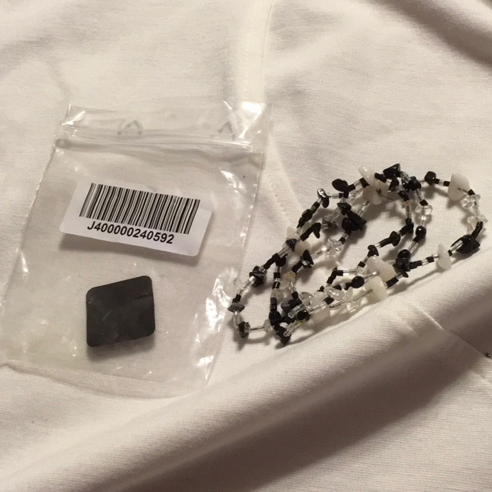 NWT, Real Collectibles by Adrienne Arpel. SWARVOWSKI CRYSTALS. Stretch bracelets